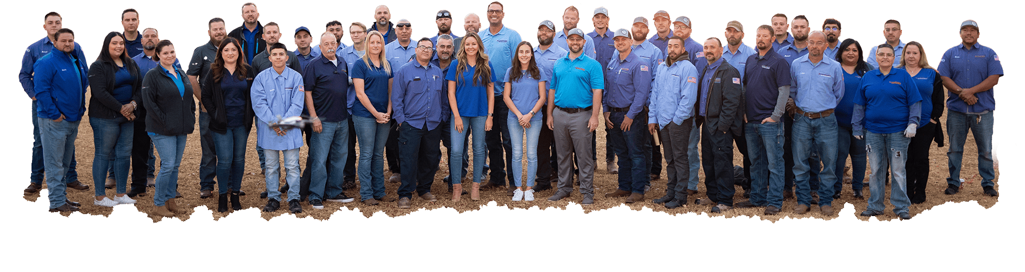 Temperature Control team standing in field outside office in Tucson, Arizona.
