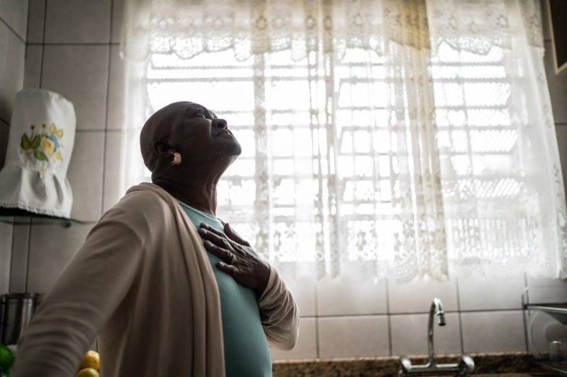 Female homeowner enjoying her home's indoor air quality.