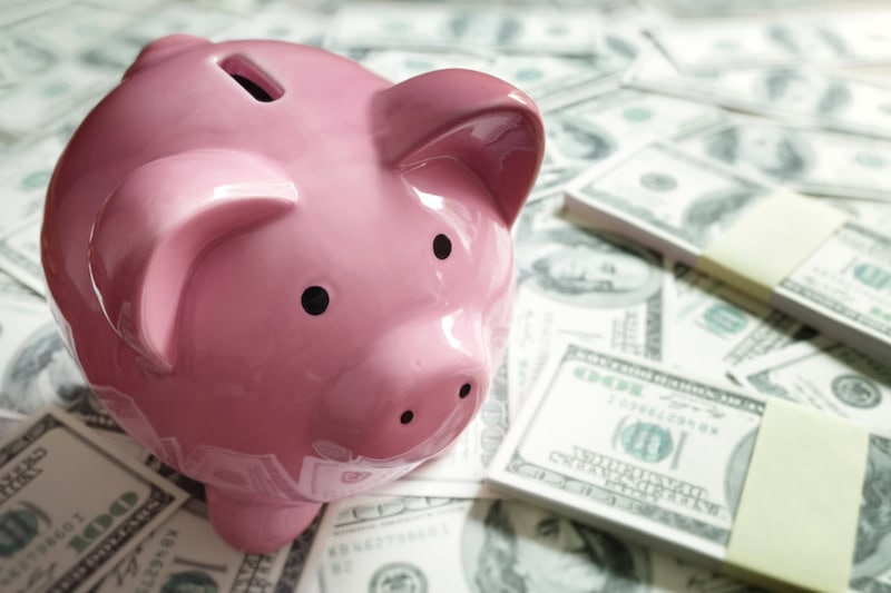 Piggy bank on money concept for business finance, investment, saving or retirement fund