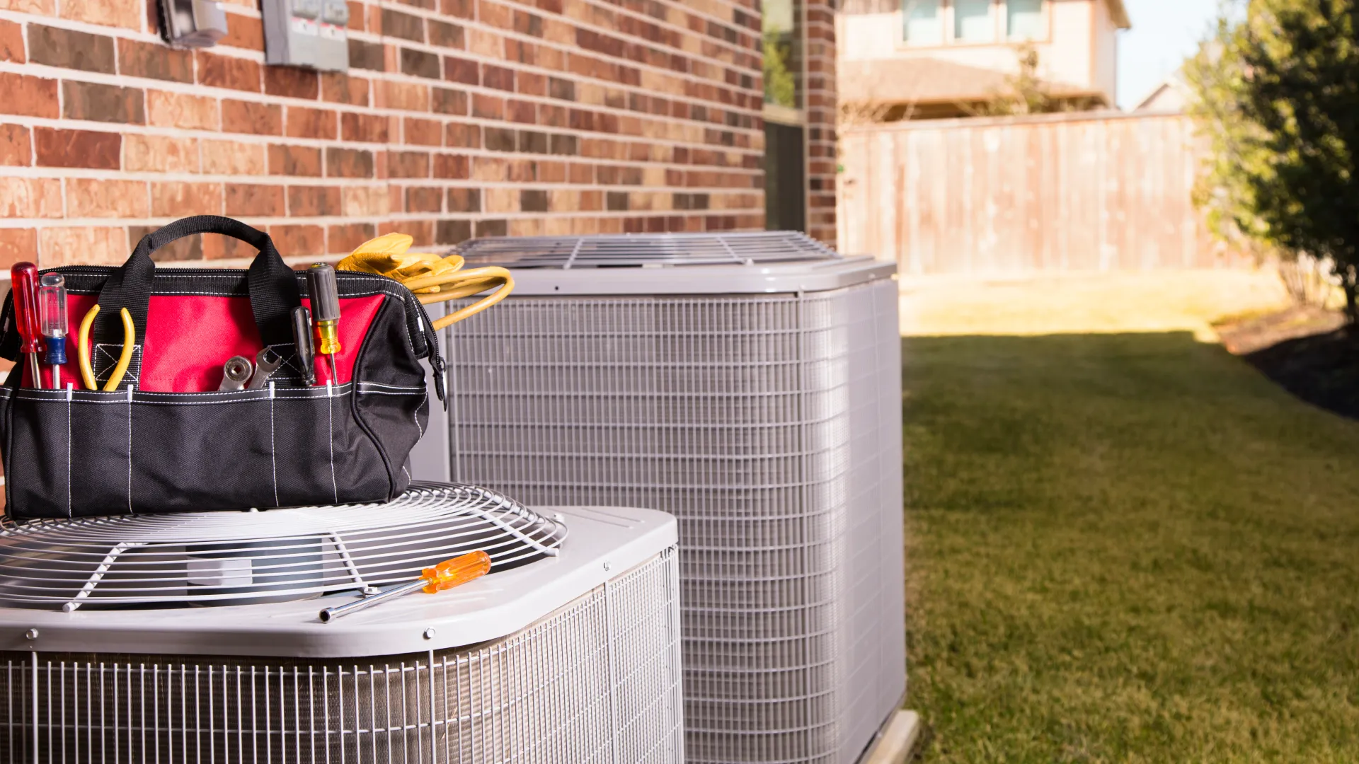 Air Conditioners Being Serviced